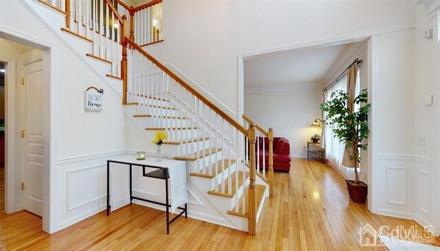 stairs with wood-type flooring