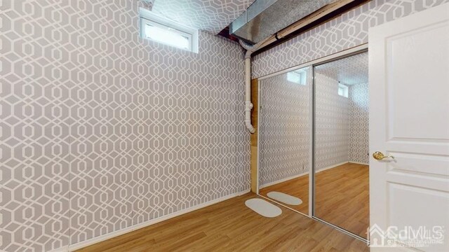 bathroom featuring wood-type flooring