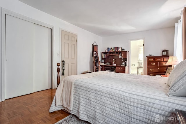 bedroom with parquet flooring