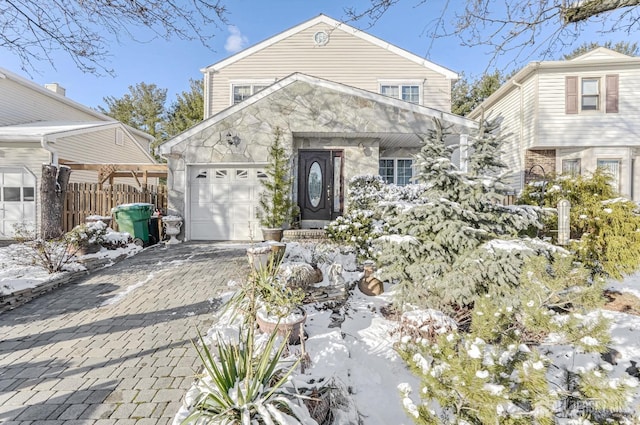 front of property with a garage