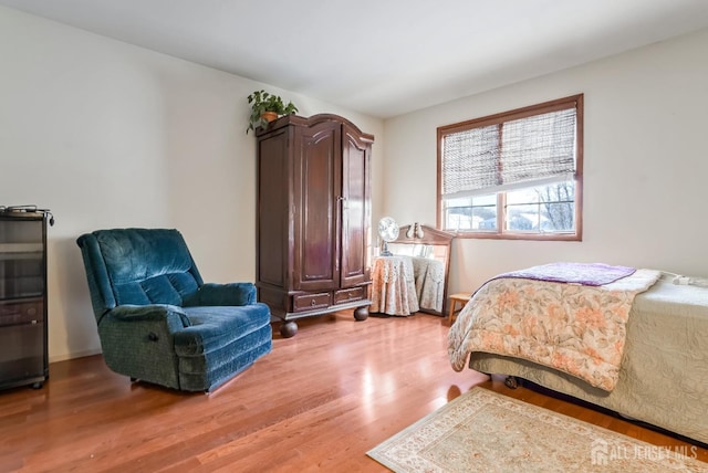 bedroom featuring wood-type flooring