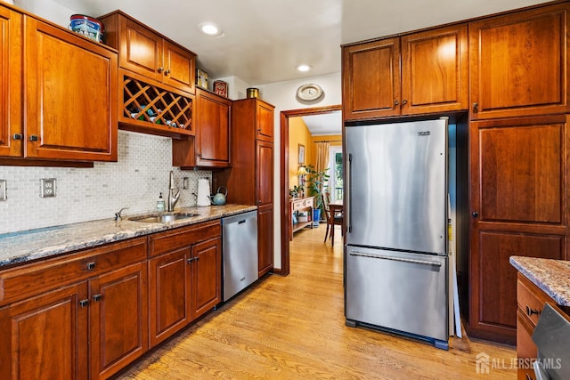 5 Meade Ct, Piscataway, NJ 08854 - kitchen featuring appliances with stainless steel finishes, light wood-type flooring, light stone countertops, backsplash, and recessed lighting