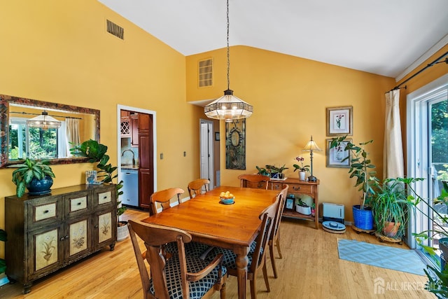 5 Meade Ct, Piscataway, NJ 08854 - dining room with light wood-type flooring and high vaulted ceiling