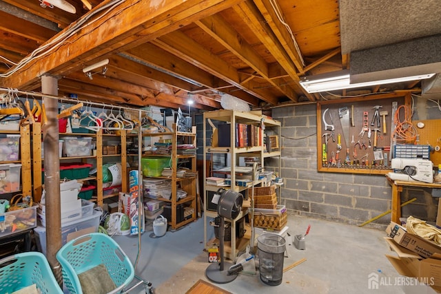 5 Meade Ct, Piscataway, NJ 08854 - unfinished basement featuring a workshop area and concrete block wall