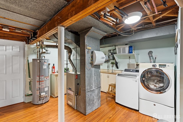 5 Meade Ct, Piscataway, NJ 08854 - washroom featuring gas water heater, independent washer and dryer, light wood finished floors, and heating unit