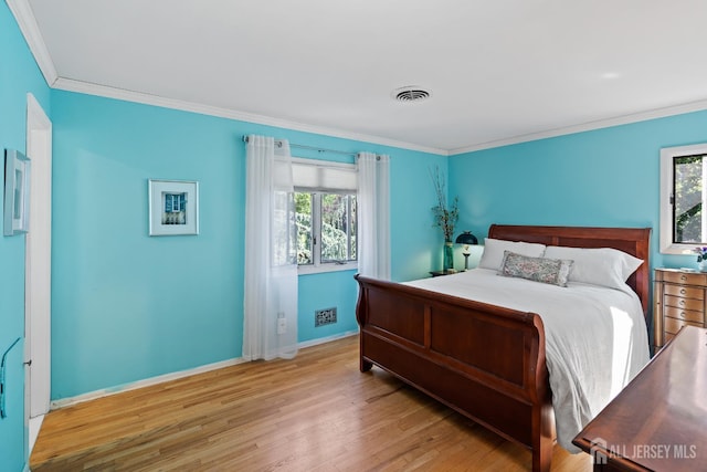 5 Meade Ct, Piscataway, NJ 08854 - bedroom with wood finished floors, crown molding, and multiple windows