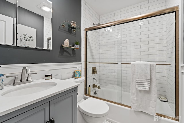 5 Meade Ct, Piscataway, NJ 08854 - full bathroom with vanity, shower / bath combination with glass door, and a wainscoted wall