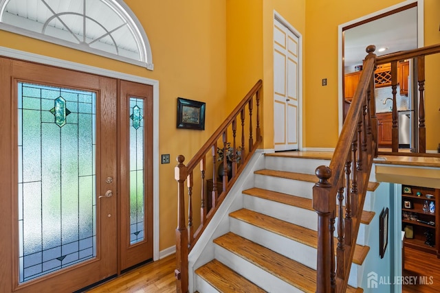 5 Meade Ct, Piscataway, NJ 08854 - foyer entrance with stairway and wood finished floors