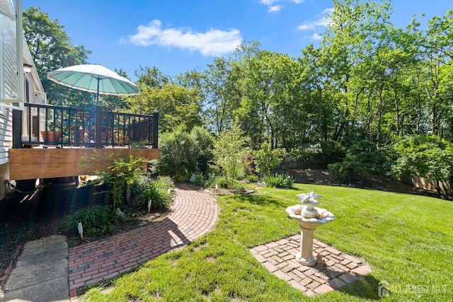 5 Meade Ct, Piscataway, NJ 08854 - view of grassy yard with a wooden deck