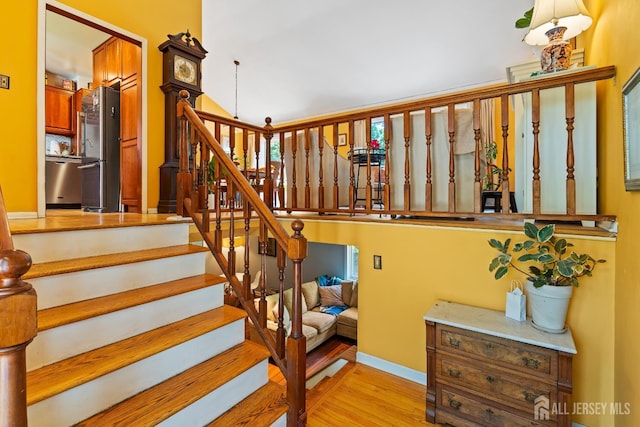 5 Meade Ct, Piscataway, NJ 08854 - staircase featuring wood finished floors
