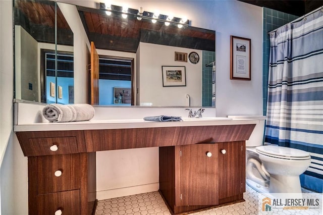 2 Snapper Ave, South River, NJ 08882 - bathroom with vanity, toilet, and curtained shower