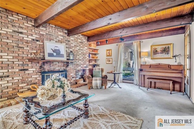 2 Snapper Ave, South River, NJ 08882 - living area featuring wood ceiling, carpet flooring, beam ceiling, a brick fireplace, and brick wall