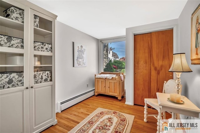 2 Snapper Ave, South River, NJ 08882 - doorway featuring baseboard heating and light wood finished floors