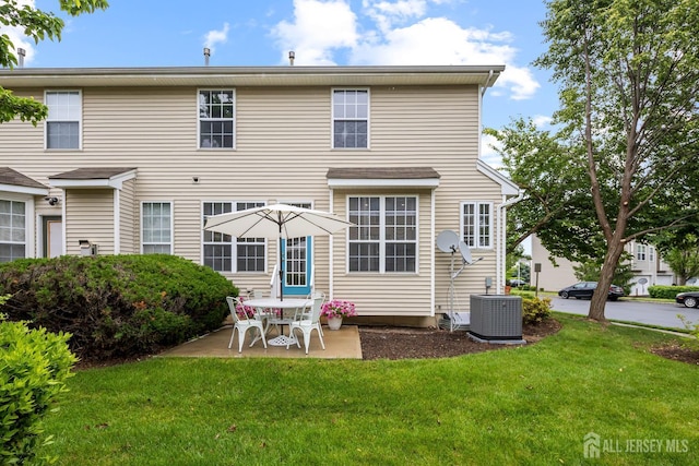 19 Grossweiler Ln, Parlin, NJ 08859 - rear view of property with central air condition unit, a patio area, and a yard