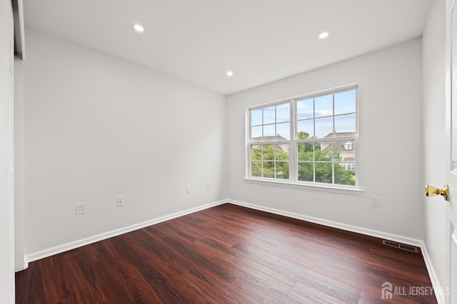19 Grossweiler Ln, Parlin, NJ 08859 - empty room with wood finished floors, baseboards, and recessed lighting