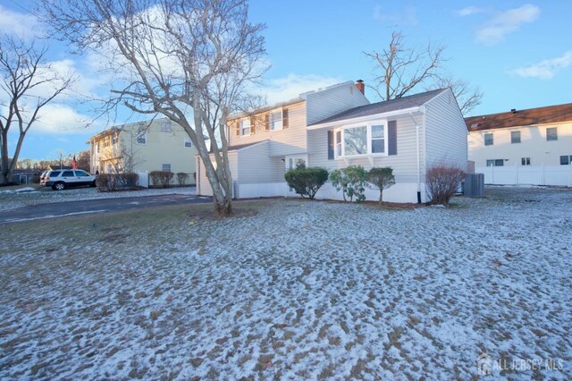 view of front of home with central air condition unit