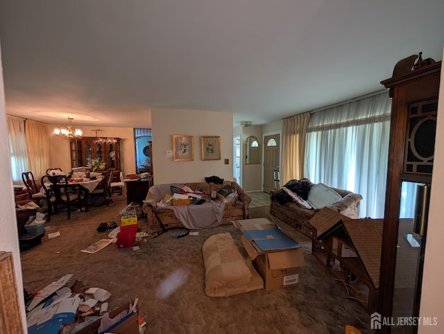 28 Tanglewood Ln, East Brunswick, NJ 08816 - living room with a chandelier, healthy amount of natural light, and carpet floors
