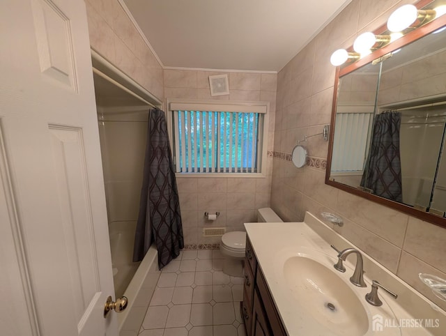 28 Tanglewood Ln, East Brunswick, NJ 08816 - full bath featuring tile walls, crown molding, tile patterned flooring, vanity, and toilet