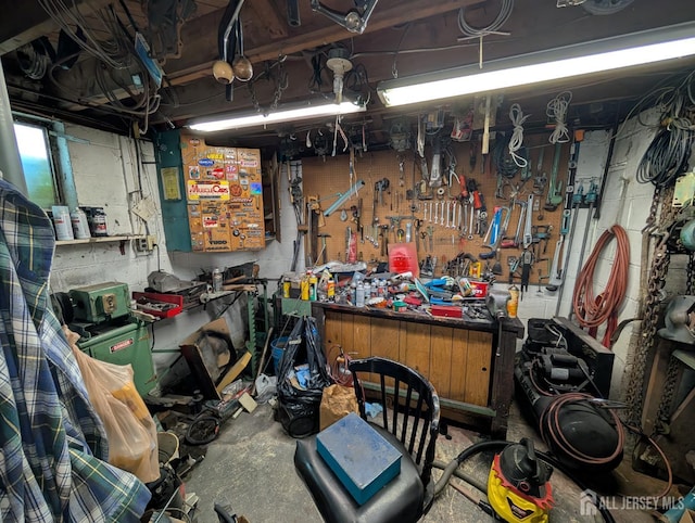 28 Tanglewood Ln, East Brunswick, NJ 08816 - garage featuring a workshop area