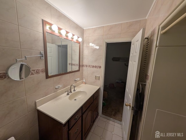 28 Tanglewood Ln, East Brunswick, NJ 08816 - bathroom featuring tile walls, vanity, crown molding, and tile patterned flooring