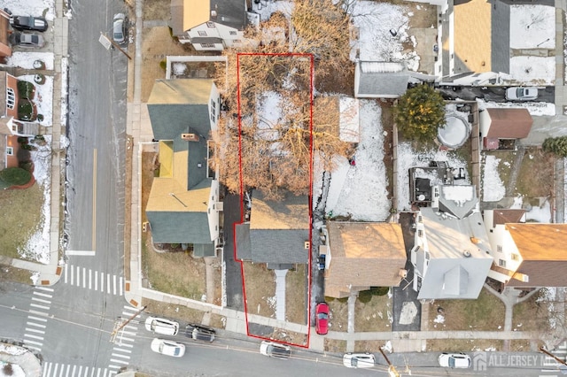 birds eye view of property with a residential view