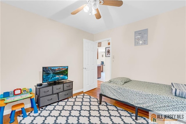 21 Wilk Rd, Edison, NJ 08837 - bedroom with wood finished floors and a ceiling fan