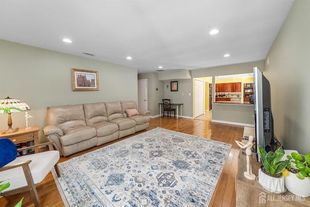 23 Boxwood Cir, Edison, NJ 08820 - living room featuring light wood-type flooring and recessed lighting