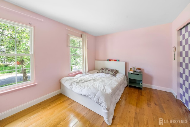 23 Boxwood Cir, Edison, NJ 08820 - bedroom with light wood-type flooring