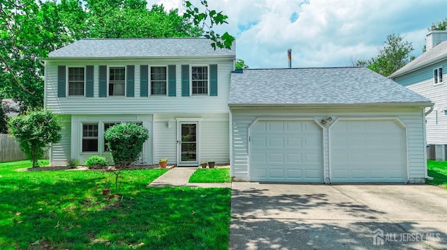 23 Boxwood Cir, Edison, NJ 08820 - view of front of property featuring an attached garage, driveway, a shingled roof, and a front lawn