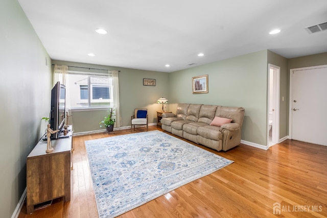 23 Boxwood Cir, Edison, NJ 08820 - living room featuring wood finished floors and recessed lighting