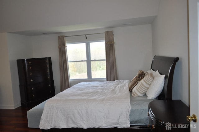 12 Sunny Ct, Monroe, NJ 08831 - bedroom with dark wood-style floors and baseboards