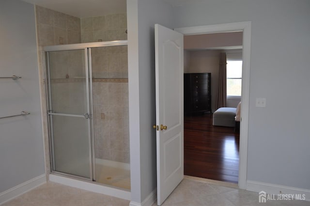 12 Sunny Ct, Monroe, NJ 08831 - bathroom with a stall shower, baseboards, and ensuite bath