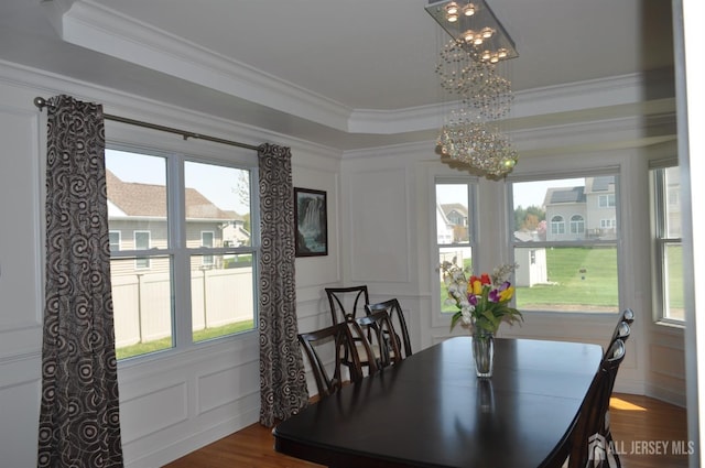 12 Sunny Ct, Monroe, NJ 08831 - dining area with a chandelier, a decorative wall, crown molding, a raised ceiling, and dark wood-type flooring