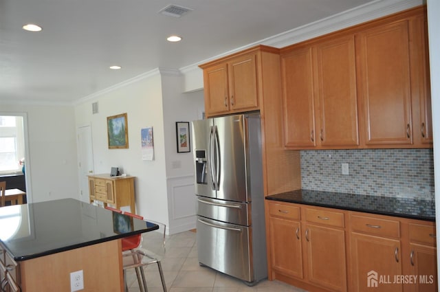 12 Sunny Ct, Monroe, NJ 08831 - kitchen featuring stainless steel fridge with ice dispenser, a breakfast bar area, crown molding, tasteful backsplash, and brown cabinetry