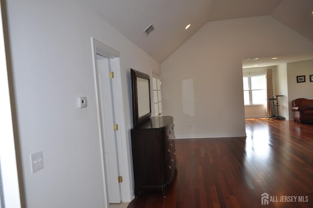 12 Sunny Ct, Monroe, NJ 08831 - hall featuring dark wood finished floors, lofted ceiling, and baseboards