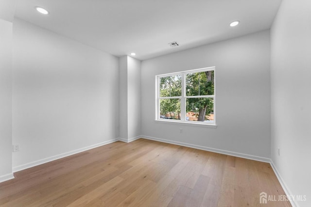243 E 9th Ave, Roselle, NJ 07203 - spare room featuring light wood-style floors and recessed lighting