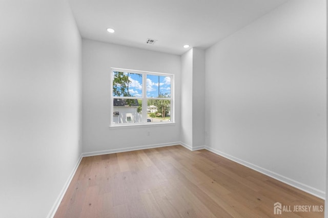 243 E 9th Ave, Roselle, NJ 07203 - spare room featuring wood finished floors and recessed lighting