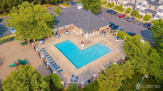908 Blossom Cir S, Brunswick, NJ 08810 - aerial view of a pool