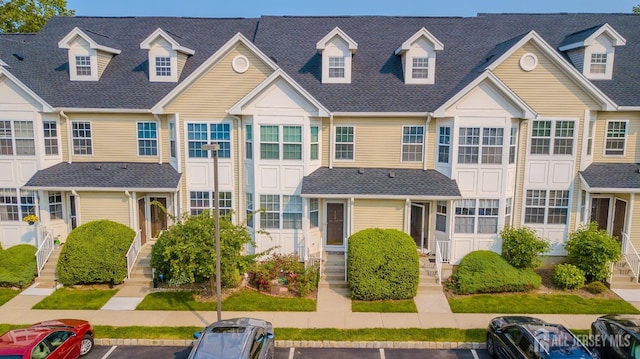 908 Blossom Cir S, Brunswick, NJ 08810 - multi unit property featuring uncovered parking, entry steps, and a shingled roof