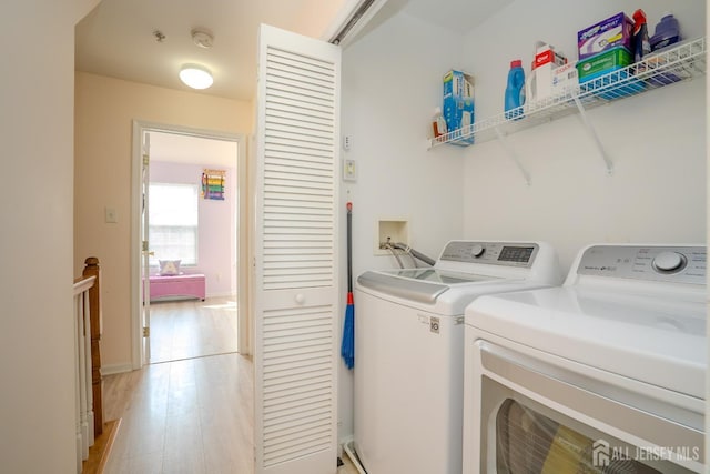 908 Blossom Cir S, Brunswick, NJ 08810 - washroom with separate washer and dryer and light wood-style flooring
