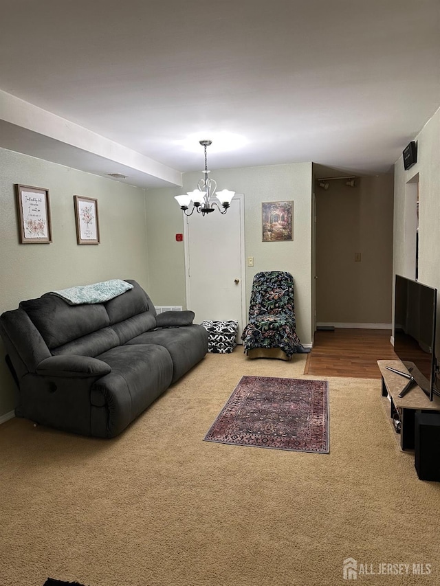 living room with an inviting chandelier