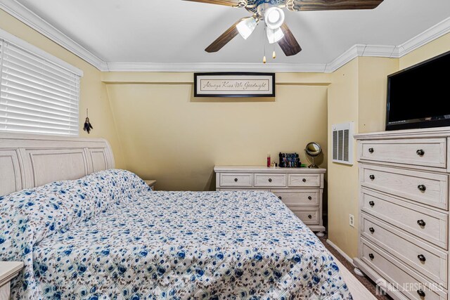 249 Garfield Ave, Old Bridge, NJ 08879 - bedroom featuring ornamental molding, ceiling fan, and wood finished floors