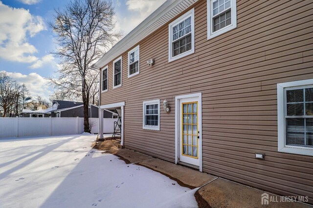 view of snow covered property