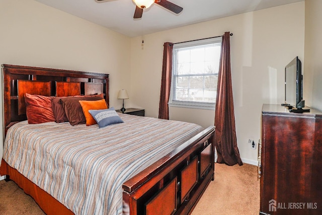 bedroom with light carpet and ceiling fan