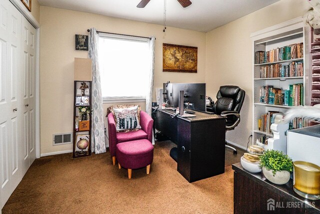 office featuring carpet floors and ceiling fan