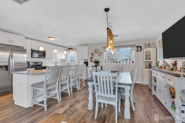 318 Bayview Ave, Union Beach, NJ 07735 - dining space with wood finished floors