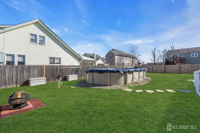 318 Bayview Ave, Union Beach, NJ 07735 - view of yard featuring an outdoor fire pit