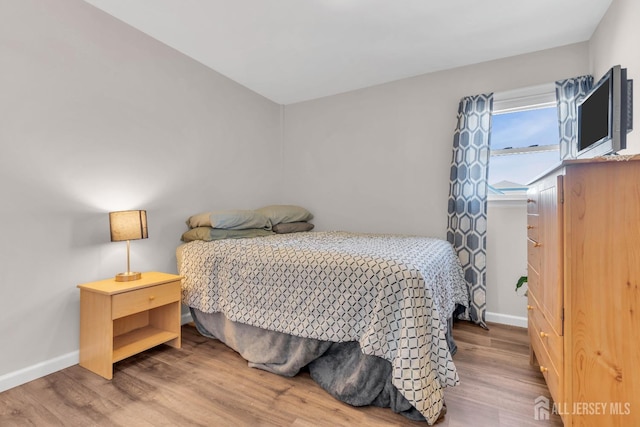 318 Bayview Ave, Union Beach, NJ 07735 - bedroom featuring baseboards and wood finished floors
