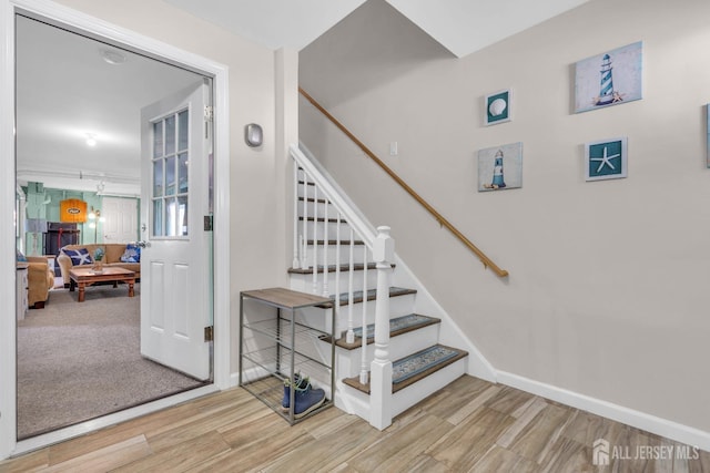 318 Bayview Ave, Union Beach, NJ 07735 - staircase featuring wood finished floors and baseboards