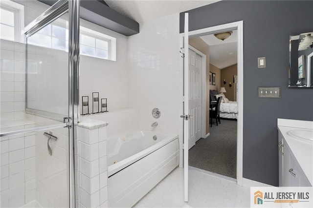 full bath with vanity, ensuite bath, tile patterned flooring, a shower stall, and a bath